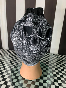 Intricate skulls head wrap